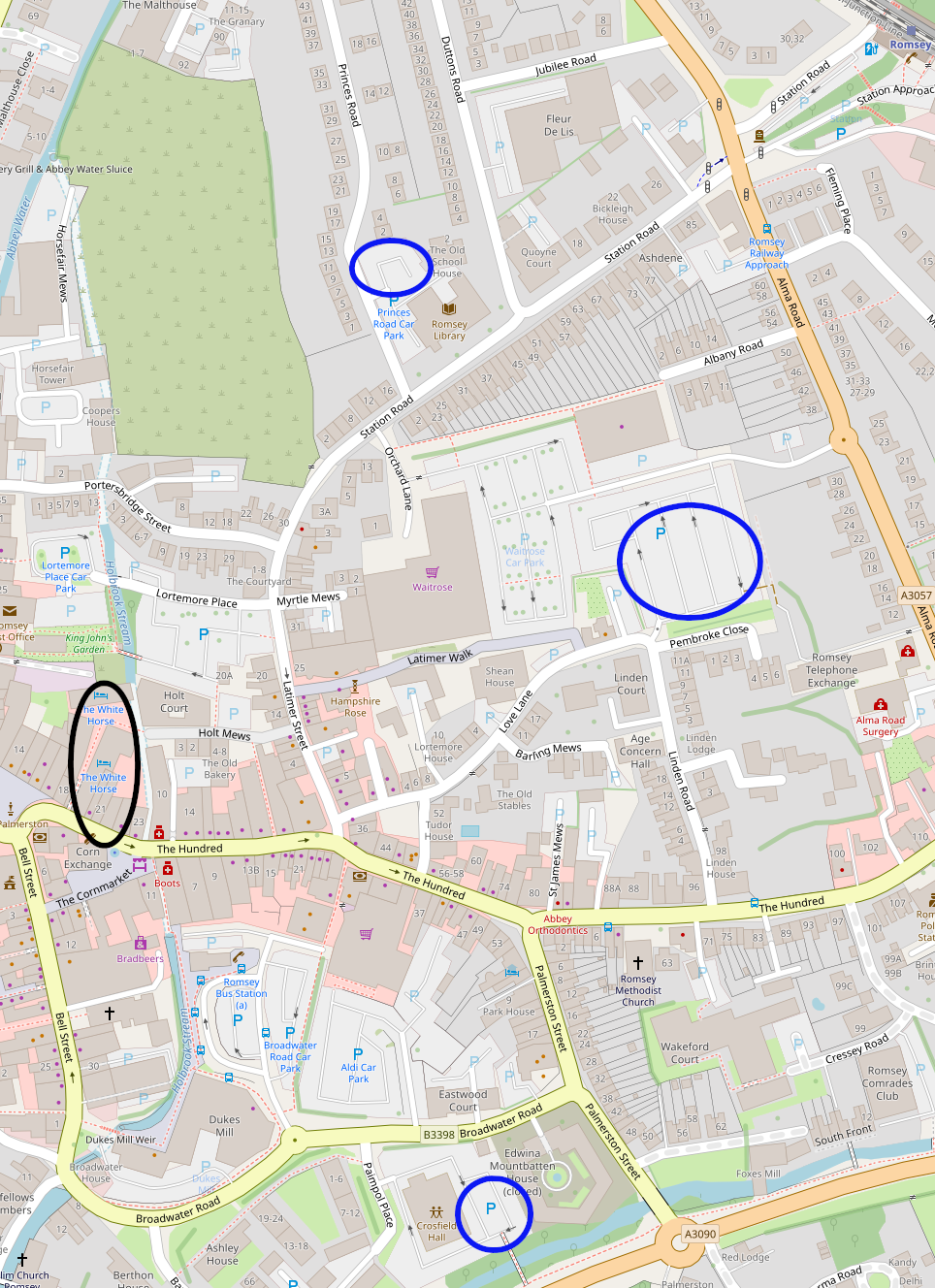 A map of Romsey showing the location of the white horse hotel (ringed in black) and nearby long stay car parks (ringed in blue)