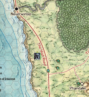 A map showing the route between Phandalin and Neverwinter. The main road goes south from Neverwinter and after 10 hexes or so a side path leads off to the east that leads to Phandalin. To the east of Neverwinter a river winds it way down from the mountains (off map). To the south of the river and east of the road is a large forest called Neverwinter Wood.